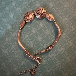 Silver Bracelet with Textured Beads and Adjustable Clasp